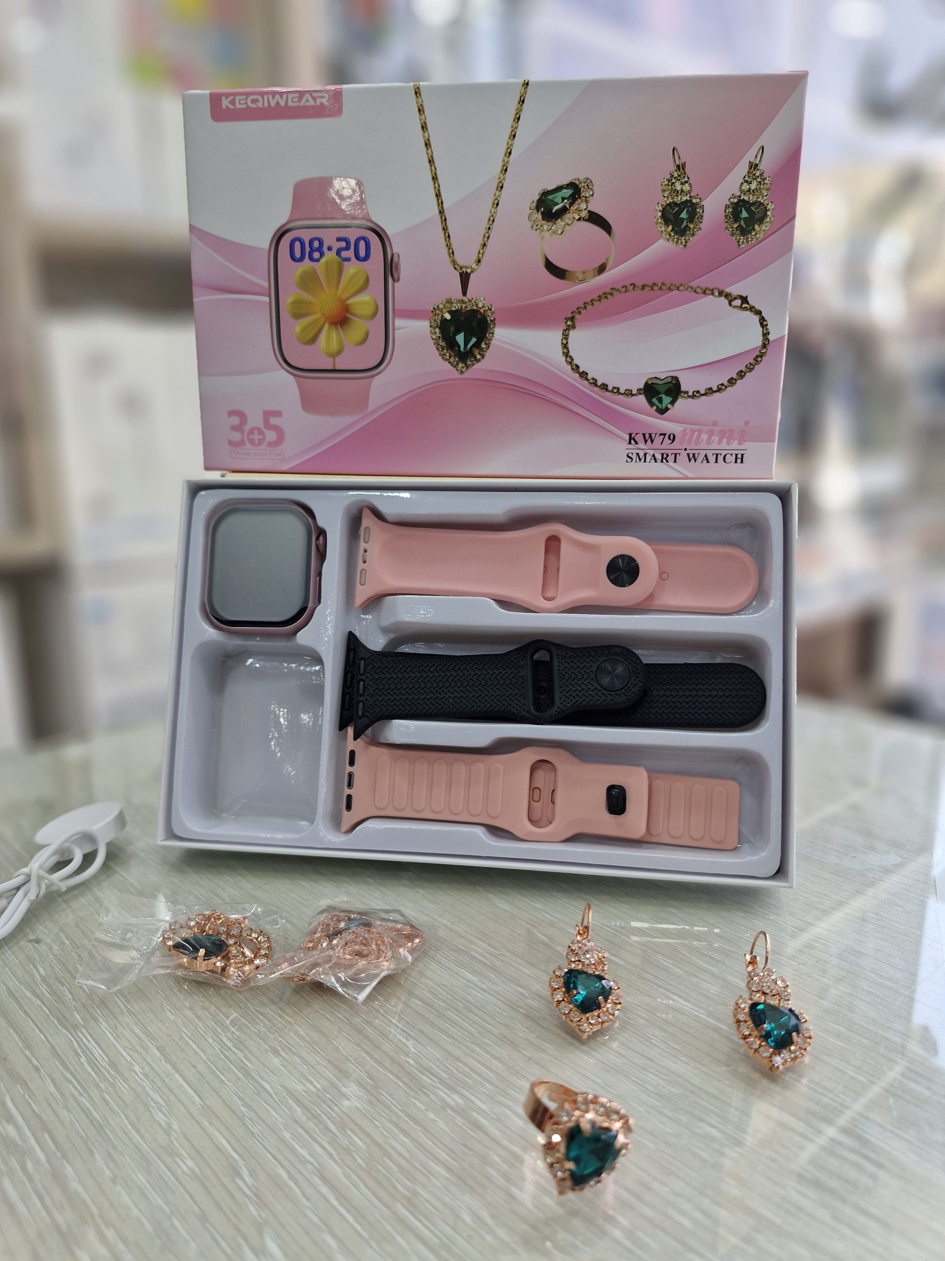 ست ساعت هوشمند و دستبند و گوشواره و گردنبند دخترانه کیکویر مدل Keqiwear KW79 Mini